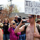 Image for article titled Pro And Anti-Topless Protesters Face Off